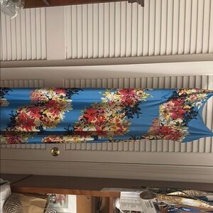 Vibrant Blue and Red Maxi Dress with Floral Accents
